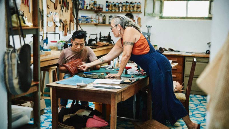 two artisans in their workshop